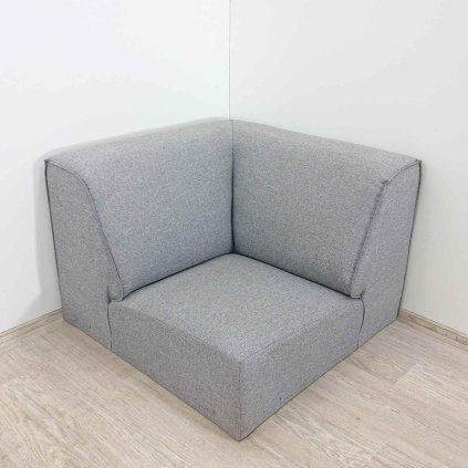 Šedý rohový díl k pohovce