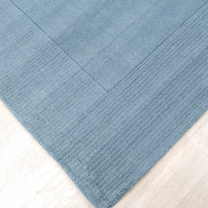 Modrý vlněný koberec 200x290 cm Textured Wool Border Flair Rugs